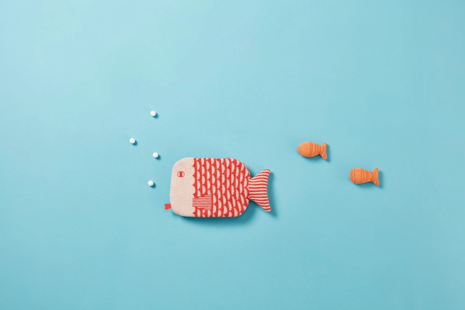 Donna Wilson Finn Hot Water Bottle - Orange 5 Donna Wilson Finn Hot Water Bottle - Orange - Image 3